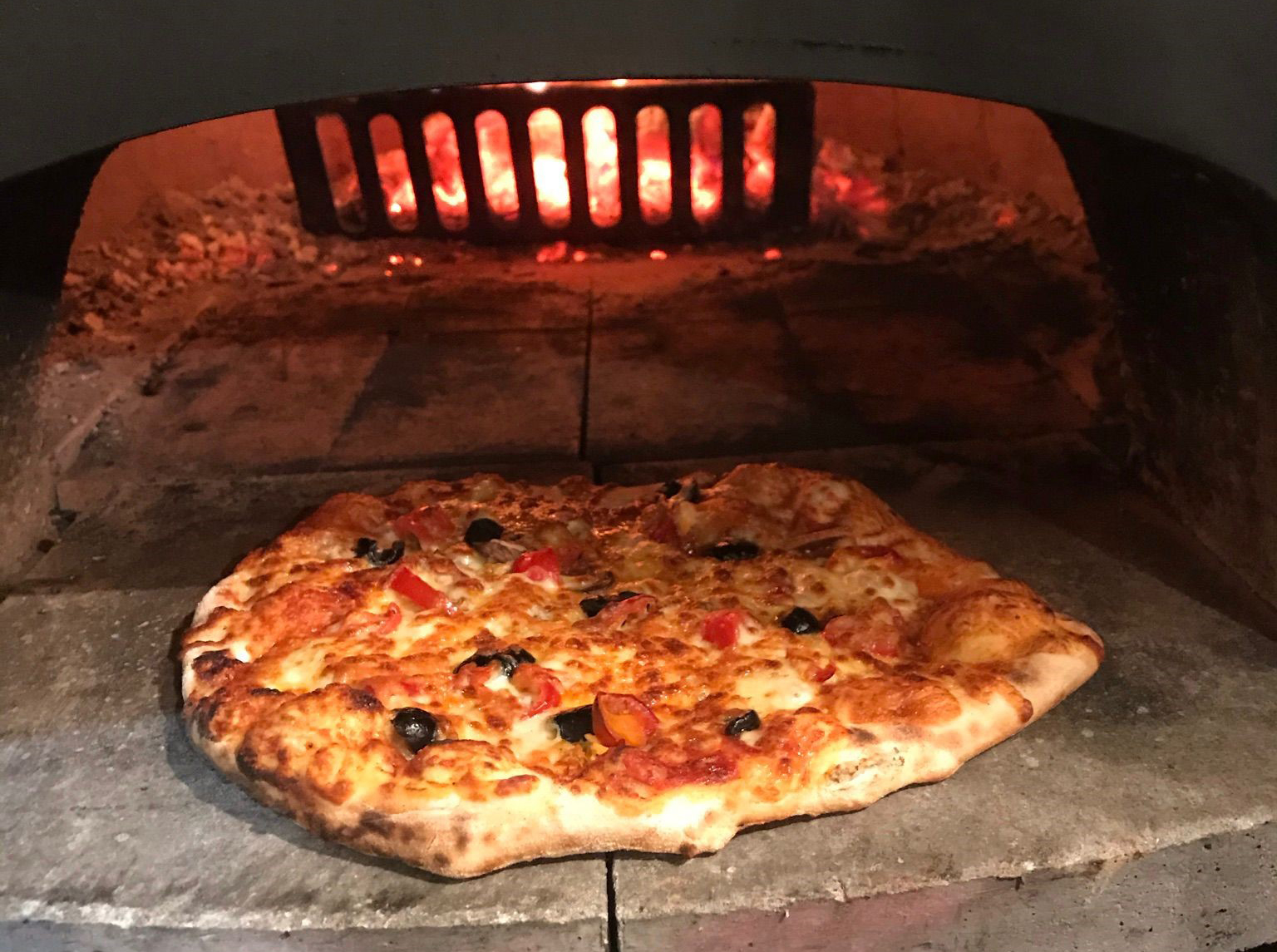 Freshly baked wood fired pizza